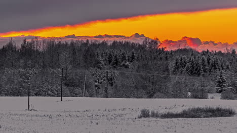 Winter-wonderland-at-sunset-during-a-contrasting-golden-sunset---time-lapse