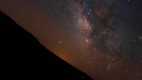 A-Milky-Way-time-lapse-that-illustrates-how-the-Earth-rotates-or-spins-in-space---camera-turns-as-the-Earth-spins