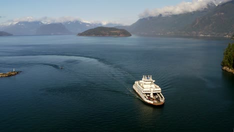 Ferry-in-Howe-Sound-BC-moves-Cars-to-the-Mainland,-Drone-Approach