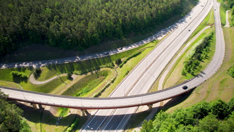Aerial-view-of-Cars-Traffic-and-Bridge-intersection-in-Gdynia-Poland-Countryside-Highway