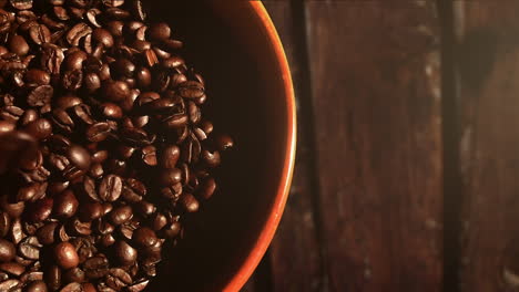 Dropping-coffee-beans-into-a-bowl