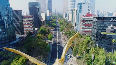 Aerial-drone-footage-of-the-Independence-Monument-in-Mexico-City-showing-the-statue-of-the-Angel-de-la-Independencia-and-the-Reforma-Avenue