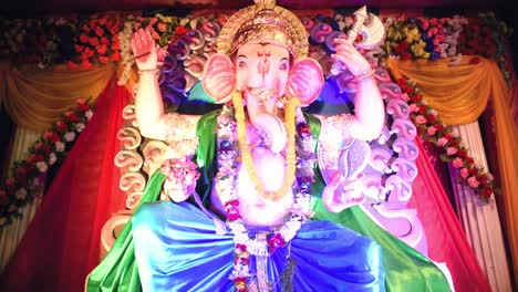 Indian-deity-Lord-Ganesha-or-Ganpati-chaturthi-festival-in-pandal-in-India-with-colorful-lights