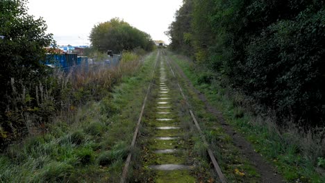 Following-old-rusty-abandoned-rail-tracks