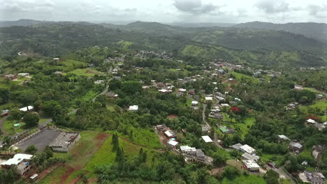 Flying-drone-above-the-houses-and-trees-in-Community-The-"Corujas
