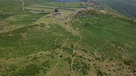 Extreme-Wide-shot-Aerial-tacking-back-from-Sharp-Tor-on-Dartmoor,-England