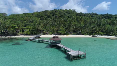 Aerial-Orbit-of-gazebo-on-a-dock-out-in-the-ocean-on-a-perfect-tropical-island,-Koh-Kood,-Thailand