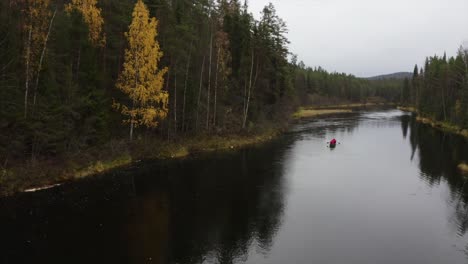 A-DRONE-FOOTAGE-OF-A-CANOE-DURING-AUTUMN