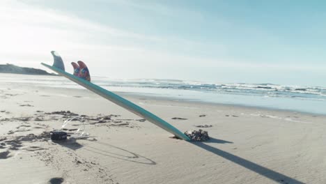 Surf-board-on-beach-paradise