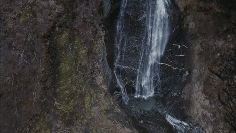 Aerial-shot-of-waterfall-in-Norwegian-wilderness