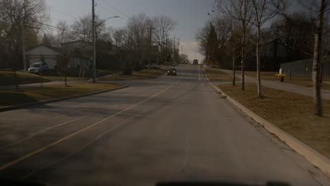 Driving-through-a-suburban-neighbourhood