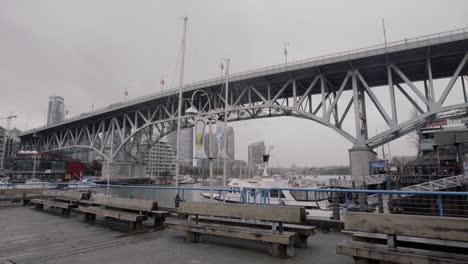 Wide-shot-of-Granville-island-bridge-and-Yaletown-on-cloudy-day