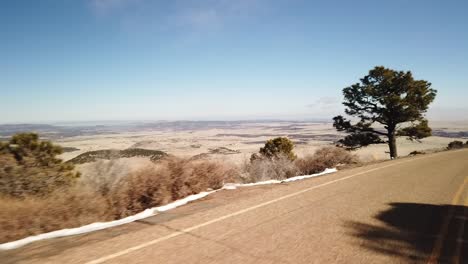 A-drive-down-a-windy-mountain-road-with-amazing-views-in-New-Mexico