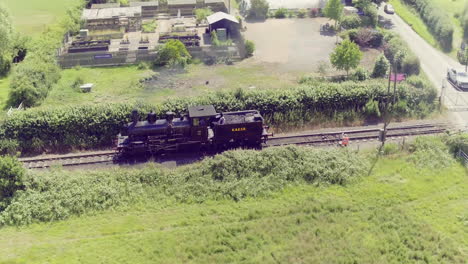 A-steam-locomotive-maneuvers-before-connecting-to-passenger-carriages-at-Bodiam-station-on-the-Kent---East-Sussex-railway