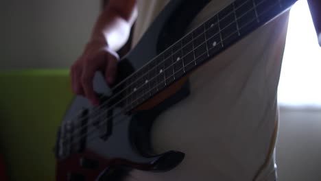 Close-up-bass-guitar-playing