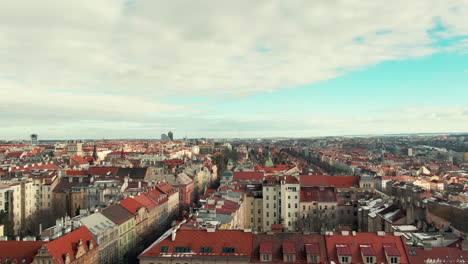 Prague-fly-over-houses-winter-sky-clouds-drone