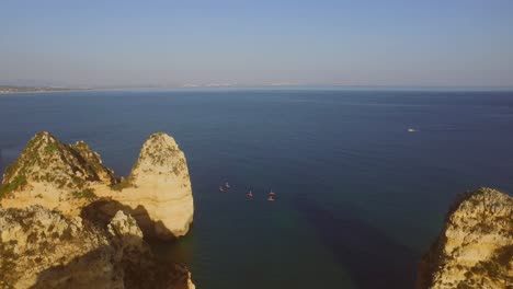 The-famous-cliffs-and-caves-of-Farol-da-Ponta-da-Piedade-in-Lagos,-Portugal