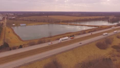 Aerial-drone-hd-footage-of-the-interstate-workers-located-in-rural-Salem,-IL