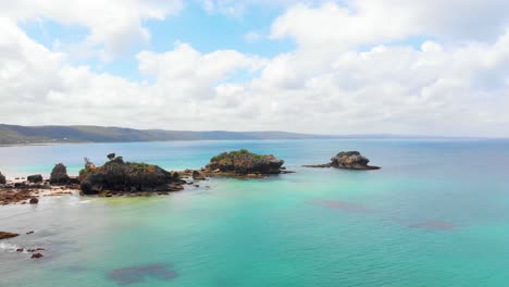 Aerial-shot-rising-up-to-the-view-of-small-islands-on-the-southern-Australian-coastline