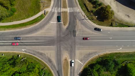 Aerial-view-of-crossroad-and-cars-driving-on-it