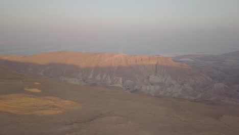 Aerial-view-of-a-valley-in-Mount-Sodom-along-the-southwestern-part-of-the-Dead-Sea-in-Israel-featuring-the-Dead-Sea-as-a-background-circa-March-2019