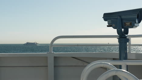 Ocean-ferry-passing-along-the-horizon