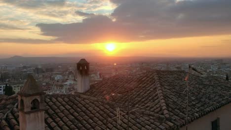Sunset-overlooking-tiled-rooftop-in-Granada-Spain