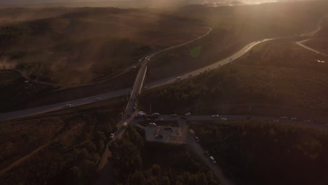 Drone-shot-of-a-race-track-crossing-the-highway