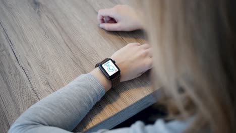 Smart-Watch---Health-Tracker-on-Display---Over-Shoulder---Slow-Motion