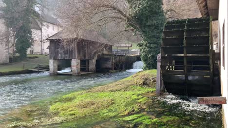 Wooden-mill-wheel-on-the-river