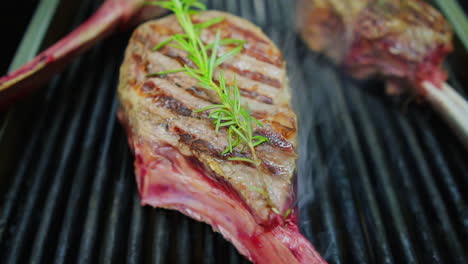 Shot-of-raw-tomahawk-on-the-grill,-Milan---Italy
