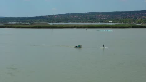 Wakeboarding-on-the-Velencei-lake,-Hungary-recorded-with-a-DJI-Mavic-2-pro-drone