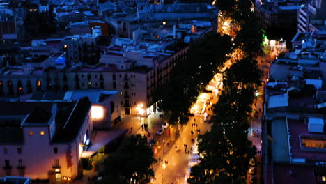 Barcelona-aerial-view-of-La-Rambla-at-night,-Spain