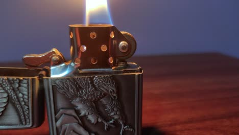Close-up-eagle-lighter-flame-on-a-table