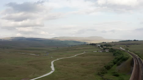 Aerial-Shot-Revealing-Ribblehead-Viaduct-in-the-Yorkshire-Dales-National-Park-on-a-Summer’s-Day