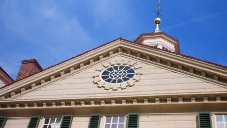 A-Medium-close-up-of-the-top-steeple-and-lighting-rod-about-the-circle-window-at-Mount-or-Mt-Vernon-also-known-as-George-Washington’s-house