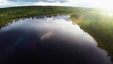 Aerial-wide-shot-of-a-lake-in-Sweden