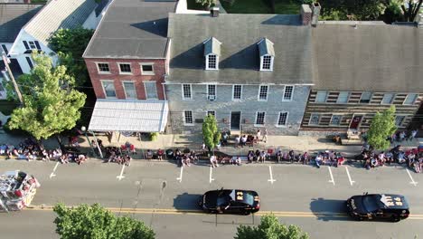 Crowds-line-sidewalks-and-streets-in-small-town-to-honor-emergency-responders-in-patriotic-parade