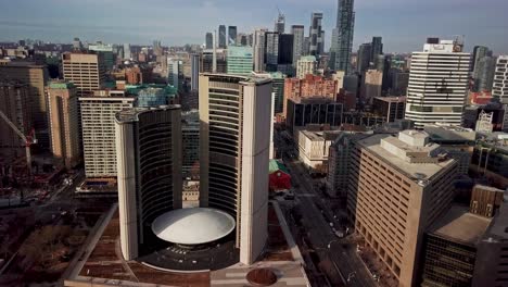 Aerial-View-of-Toronto-City-Hall-and-Downtown-Skyscrapers,-Wide-Dolly-In