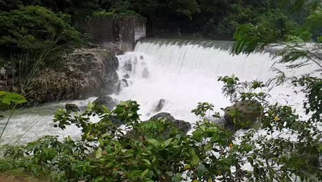 wide-shot-of-wawa-dam-waterfalls-in-slow-motion