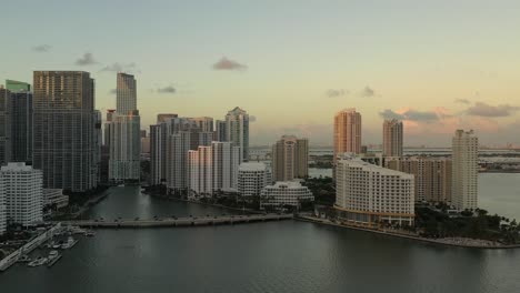 Cinematic-Dolly-Aerial-Shot-of-Brickell-Key-In-Miami-Florida-at-Sunset-During-Golden-Hour