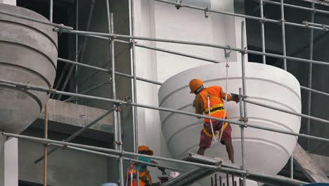 Construction-Workers-Coating-of-Plaster-on-the-Wall