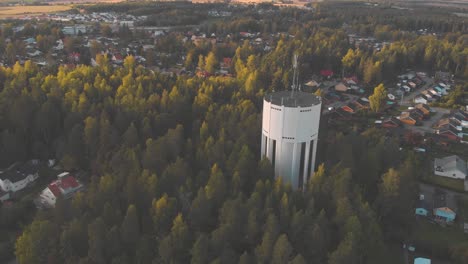 Drone-flying-away-from-water-tower