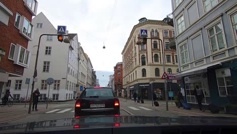 Driving-through-urban-Streets-in-Copenhagen,-Denmark