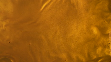 Liquid-gold-wave-background