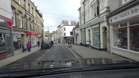 Whitby,-England---October-2019:-A-slow-drive-through-the-quaint-narrow-streets-of-Flowergate-and-Brunswick-Street