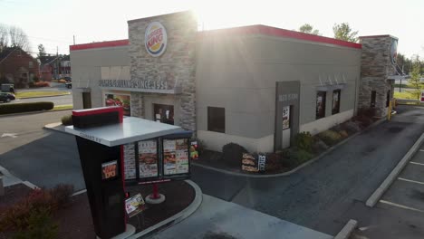 Aerial,-Burger-King-restaurant-drive-through,-home-of-flame-grilling-fast-food