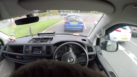 Time-lapse-shot-of-a-man-driving-a-van-through-the-town-of-Ashford,-Kent,-UK