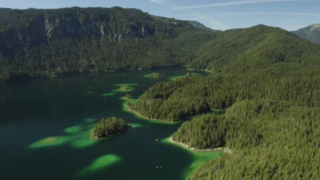 The-amazing-lake-Eibsee-in-Germany,-aerial-shot-filmed-by-drone