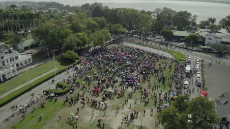 Protest-in-Suriname-in-February-against-the-government,-drone-descending-camera-tilt